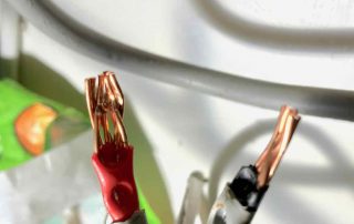 Cables secured through sheath