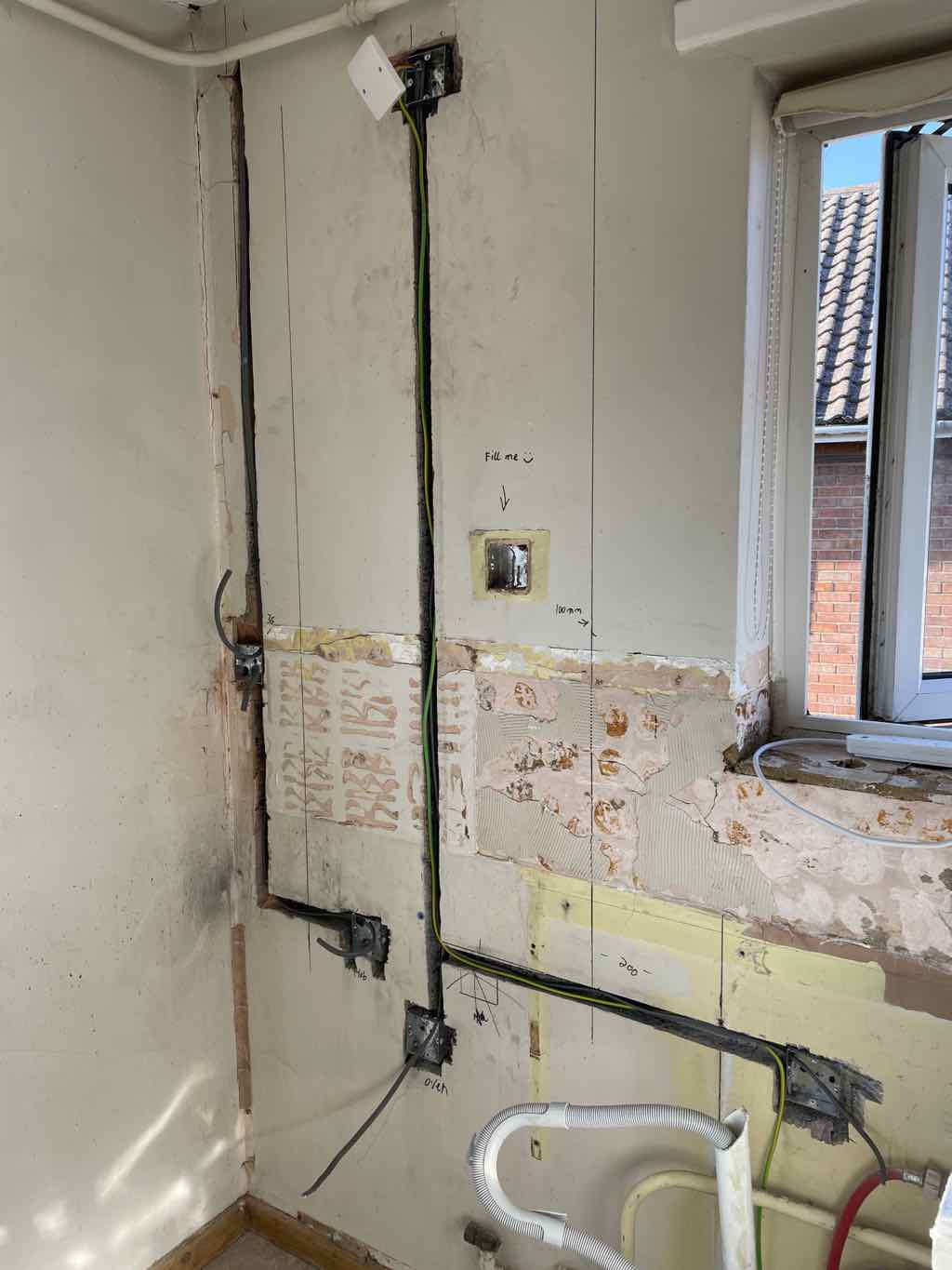 Neat wall chasing on a kitchen rewire - JDH Electrics