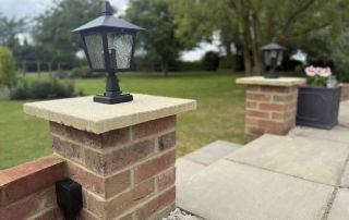 Coach light installed onto new brick wall - JDH Electrics - Patio & Garden Lighting